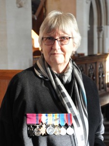 Daughter Edna proudly displays her fathers medals - VC on the left